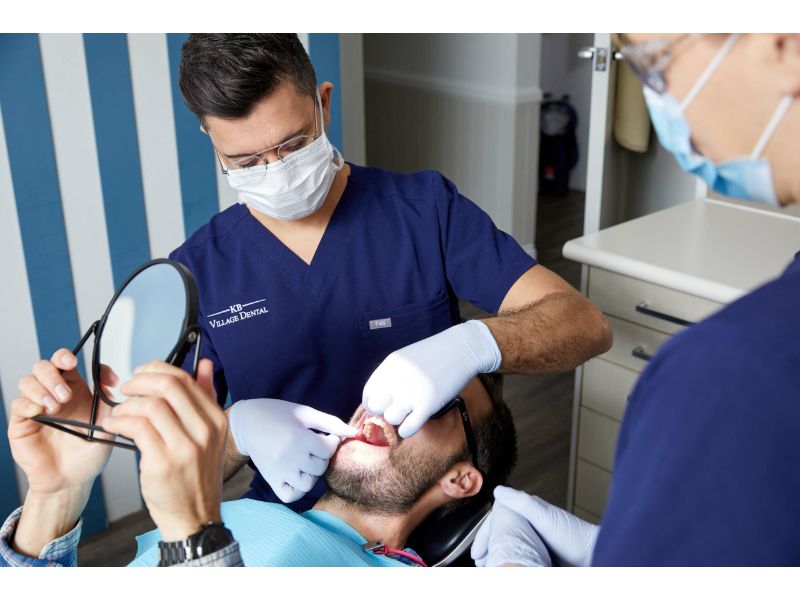 KB Village dentist treating patient