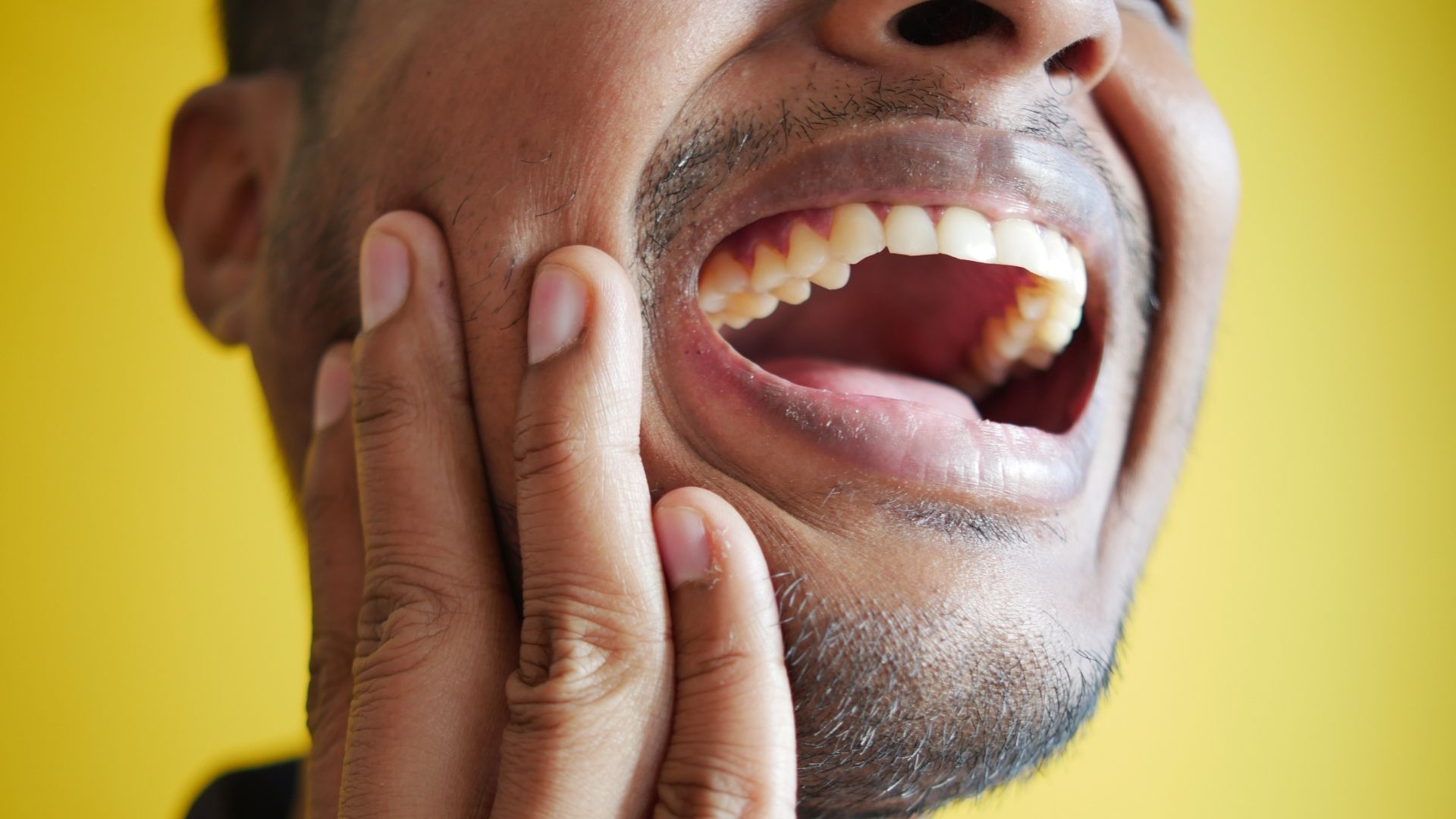 man with sensitive teeth